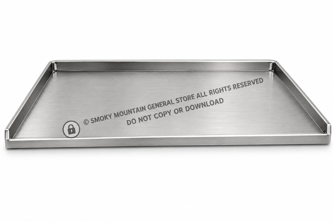 A rectangular stainless steel tray with a brushed metal finish